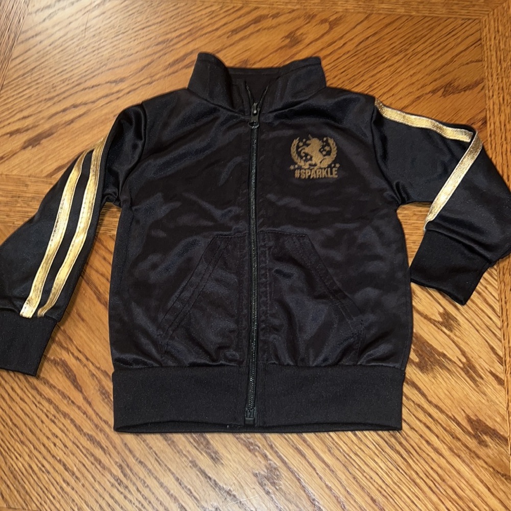 Angel Face Girls' Track jacket Black w gold sparkle stripes on arm. S 18 months